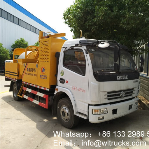 Asphalt road pothole patcher repair truck