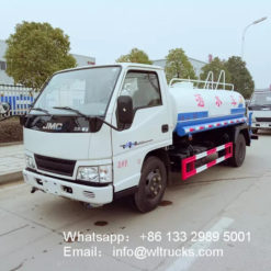 JMC 1200 gallon water spray truck