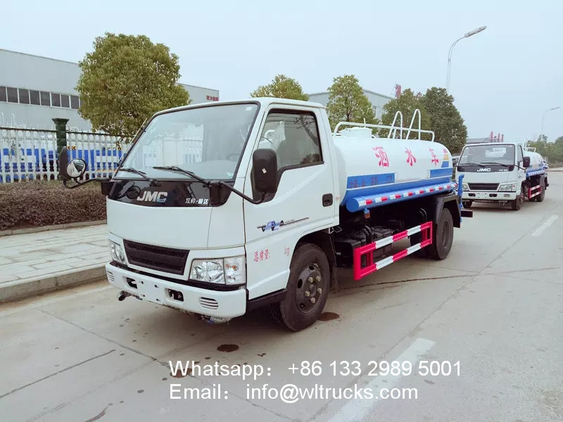 JMC 1200 gallon water spray truck