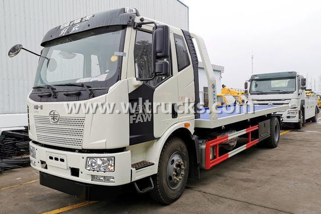 Yellow plate wrecker truck