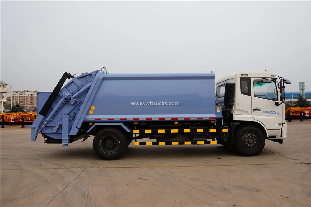 swing arm compactor garbage truck